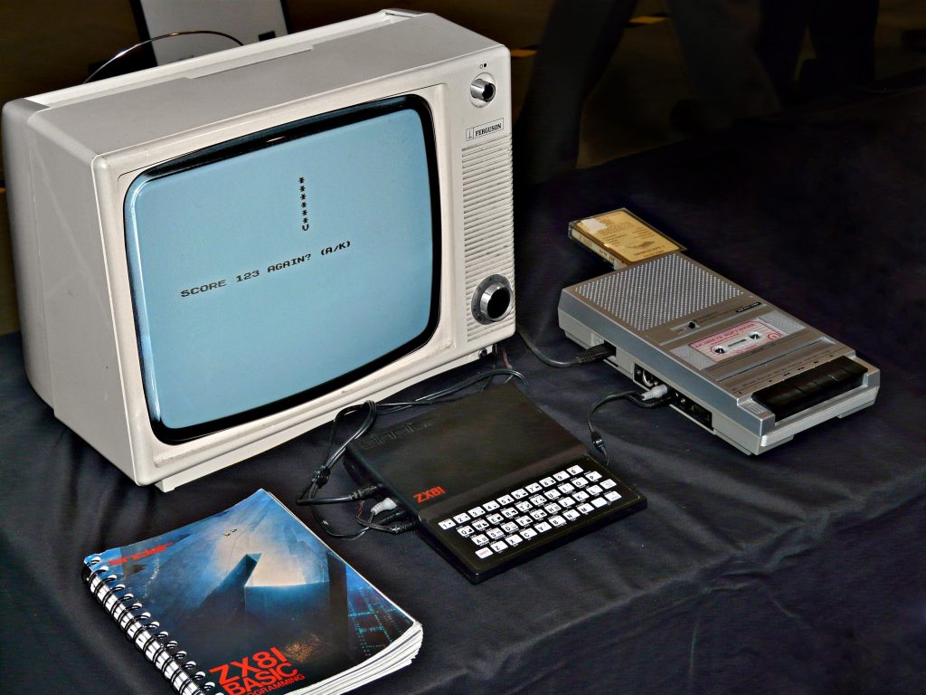 Sinclair ZX81 connected to a cassette recorder and black-and-white television, showing the equipment used to load and save programs
